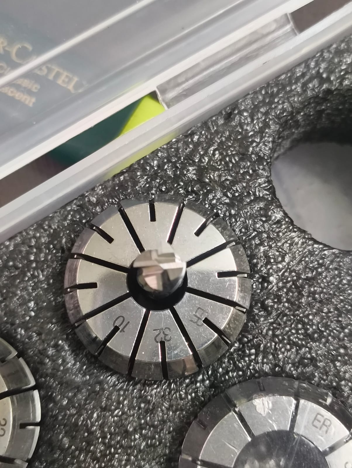 Reground tungsten carbide end mill after precision sharpening